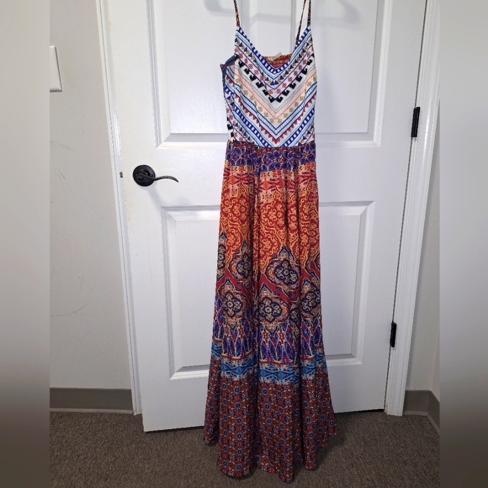 A Moon Orchid boho pleated maxi dress with spaghetti straps in a size small